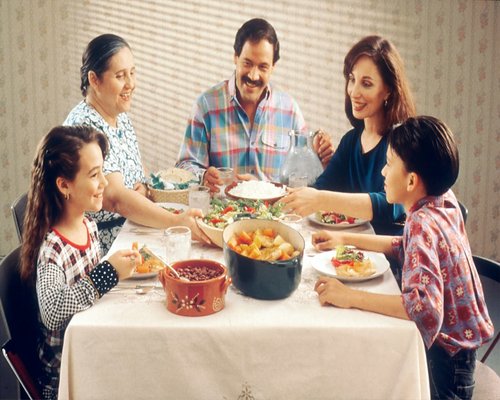 family sharing a simple homemade dinner